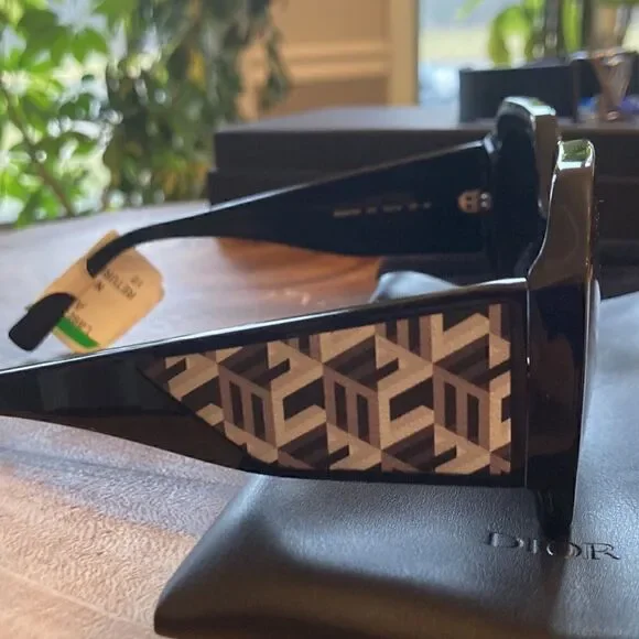 MCM NEW MCM 709S 002 Black Sunglasses With Anniversary Print On Temple